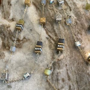 Brighton square station long necklace. Black, gold , silver , crystals, !!